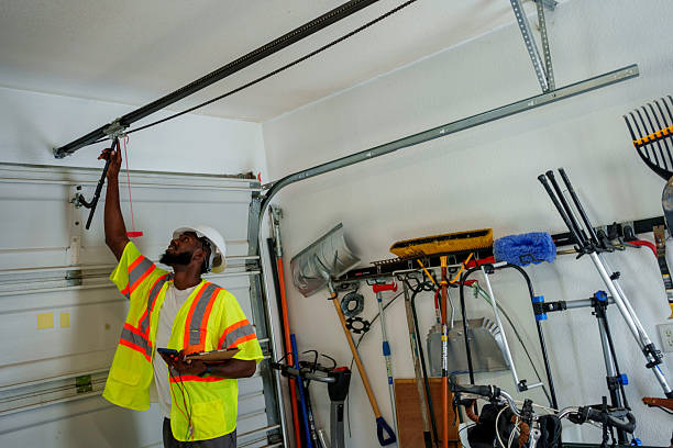Professional Garage Door Panel Replacement technician working in McLean County County, IL